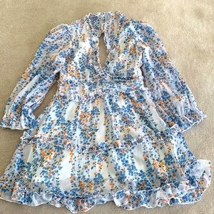 Flirty feminine and floral dress great for summer and spring!